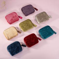 The velvet jewellery cases arranged flat, showing the full colour range