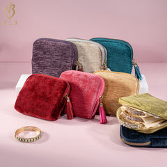 Meltique Velvet Travel Jewelry Case shown in several colours with tassel zip pulls