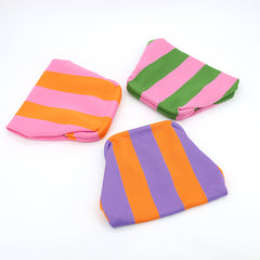 Three clutches folded flat for packing