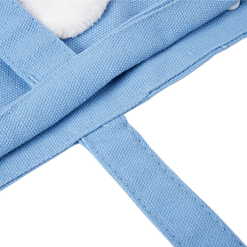 Detail of the woven canvas and wide shoulder straps